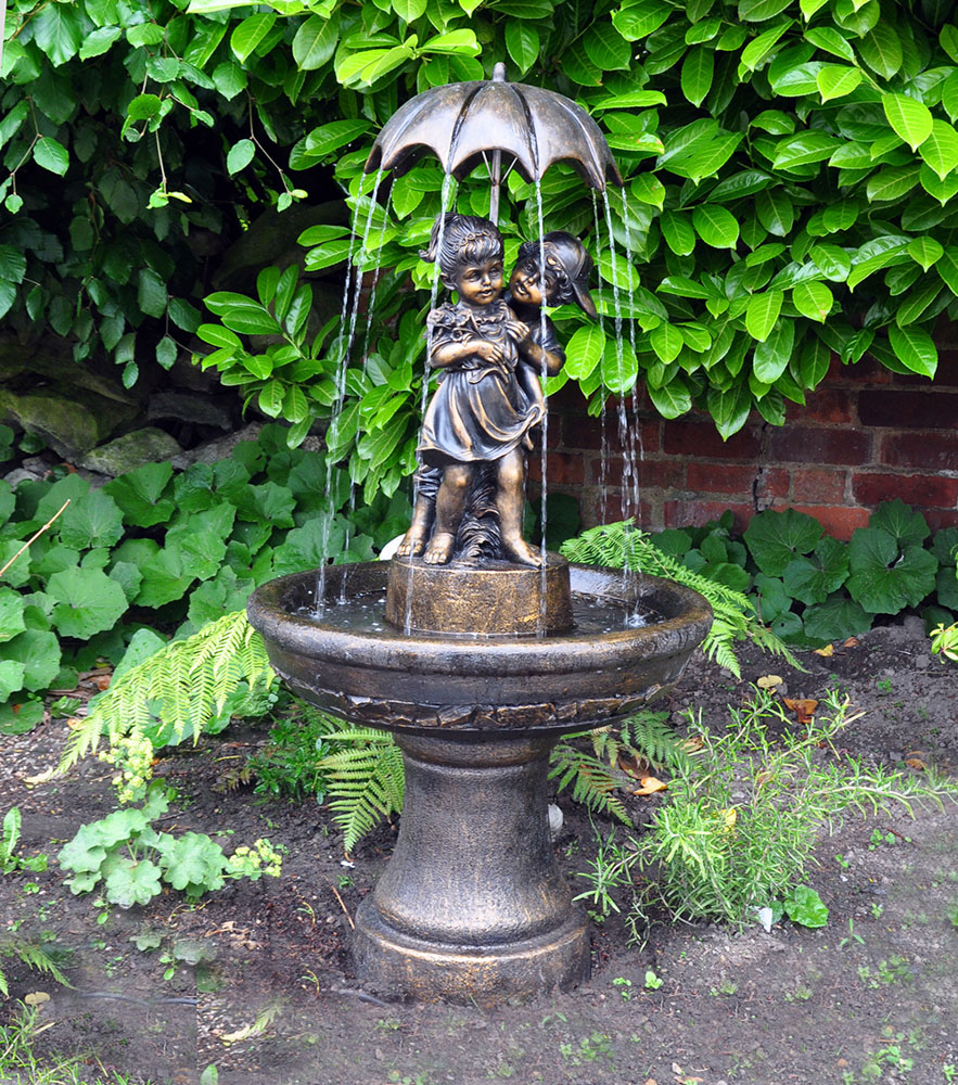 Boy And Girl Under Umbrella Water Feature Fountain | Bonningtons